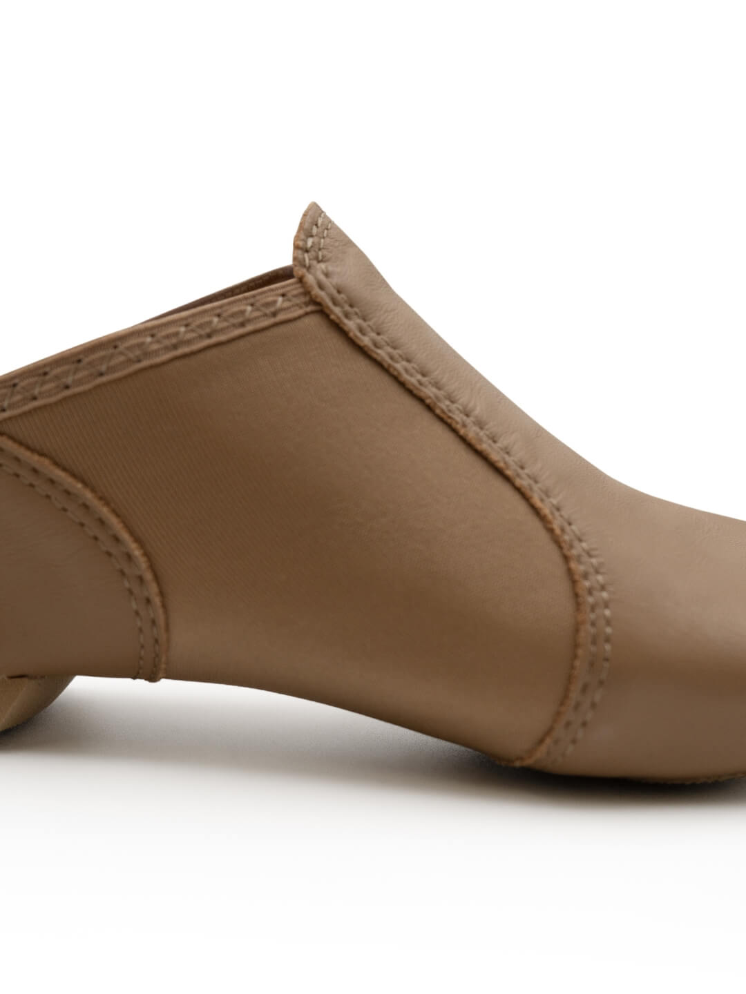 Side profile view of a pair of E-Series Jazz Slip On shoes together in Caramel on a seamless white background.