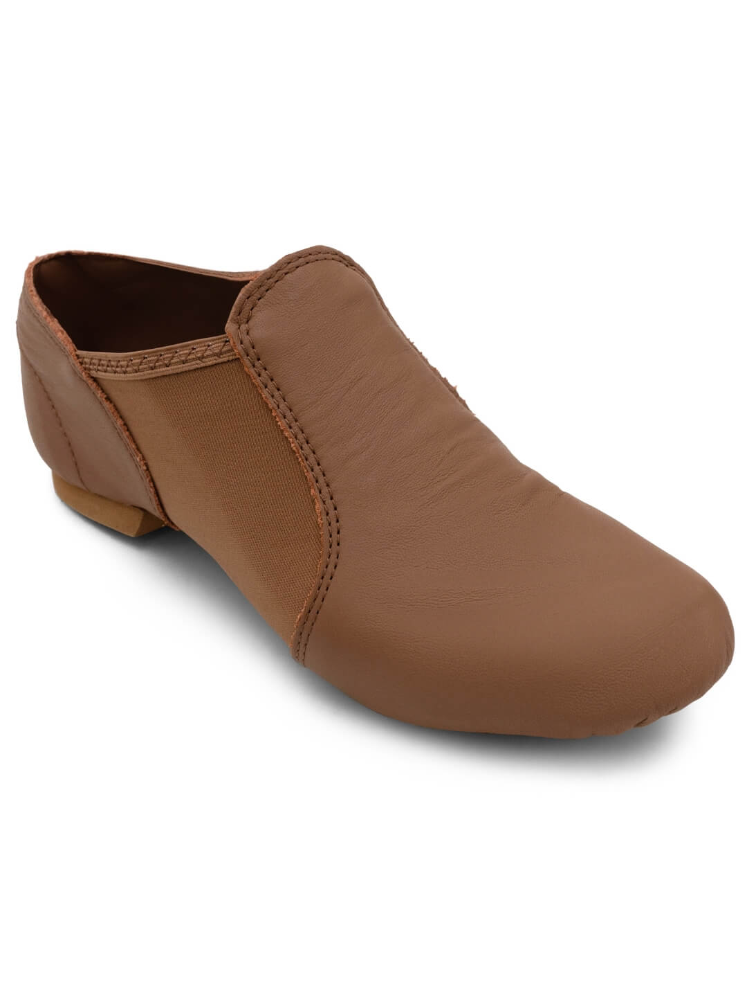 Three-quarter angled view of E-Series Jazz Slip On shoes in Skintone 60 on a solid white background.